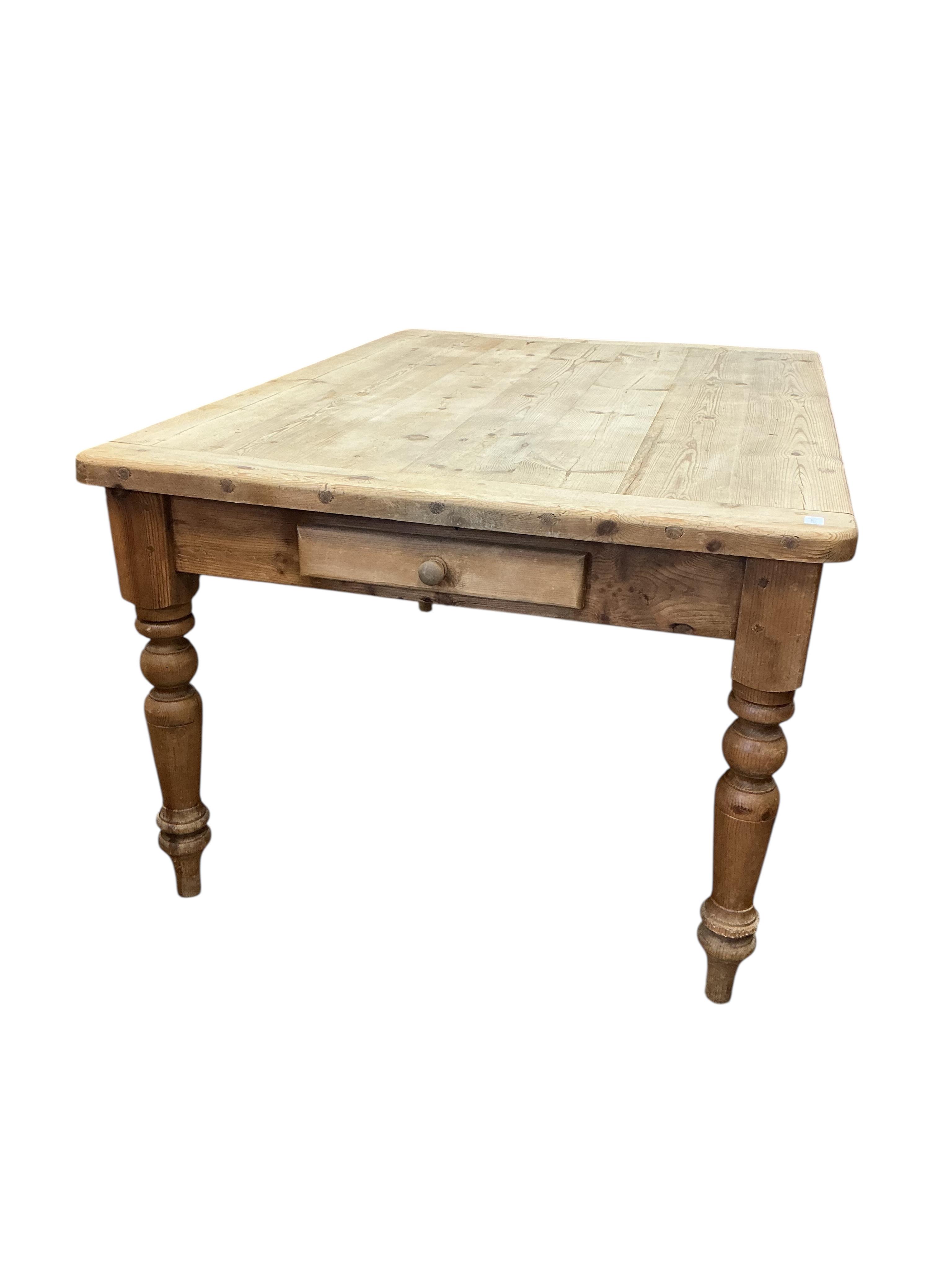A Victorian style pine kitchen table, fitted two drawers, width 152cm, depth 106cm, height 78cm